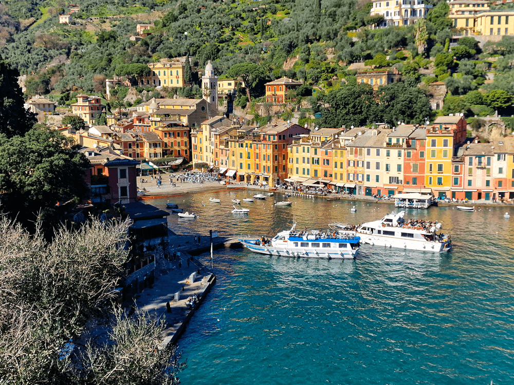 4 days in Liguria: an easy coastal trip 3 Portofino’s small harbour with colourful houses and several boats moored in front.